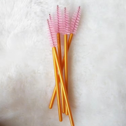 Eyebrow and eyelash brushes, nylon, with golden handle and pink bristles, 50 pcs